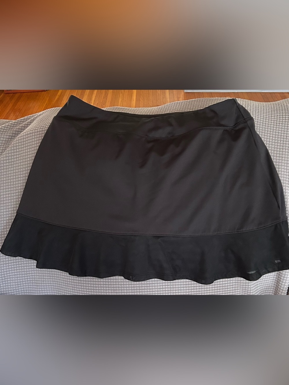 Tommy Bahama Black A-Line Skirt with Ruffle Hem and built in briefs
 size L
